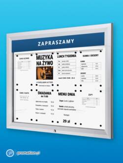 Zamykana gablota P405Lx8 na 8 kartek A4 w aluminiowej ramie, z tabliczką na napis u góry, na niebieskim tle